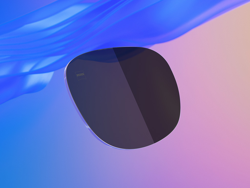 한 쪽은 낮은 농도, 다른 한 쪽은 짙은 농도를 보여주는 변색 선글라스 렌즈의 3D 컴퓨터 그래픽 일러스트레이션