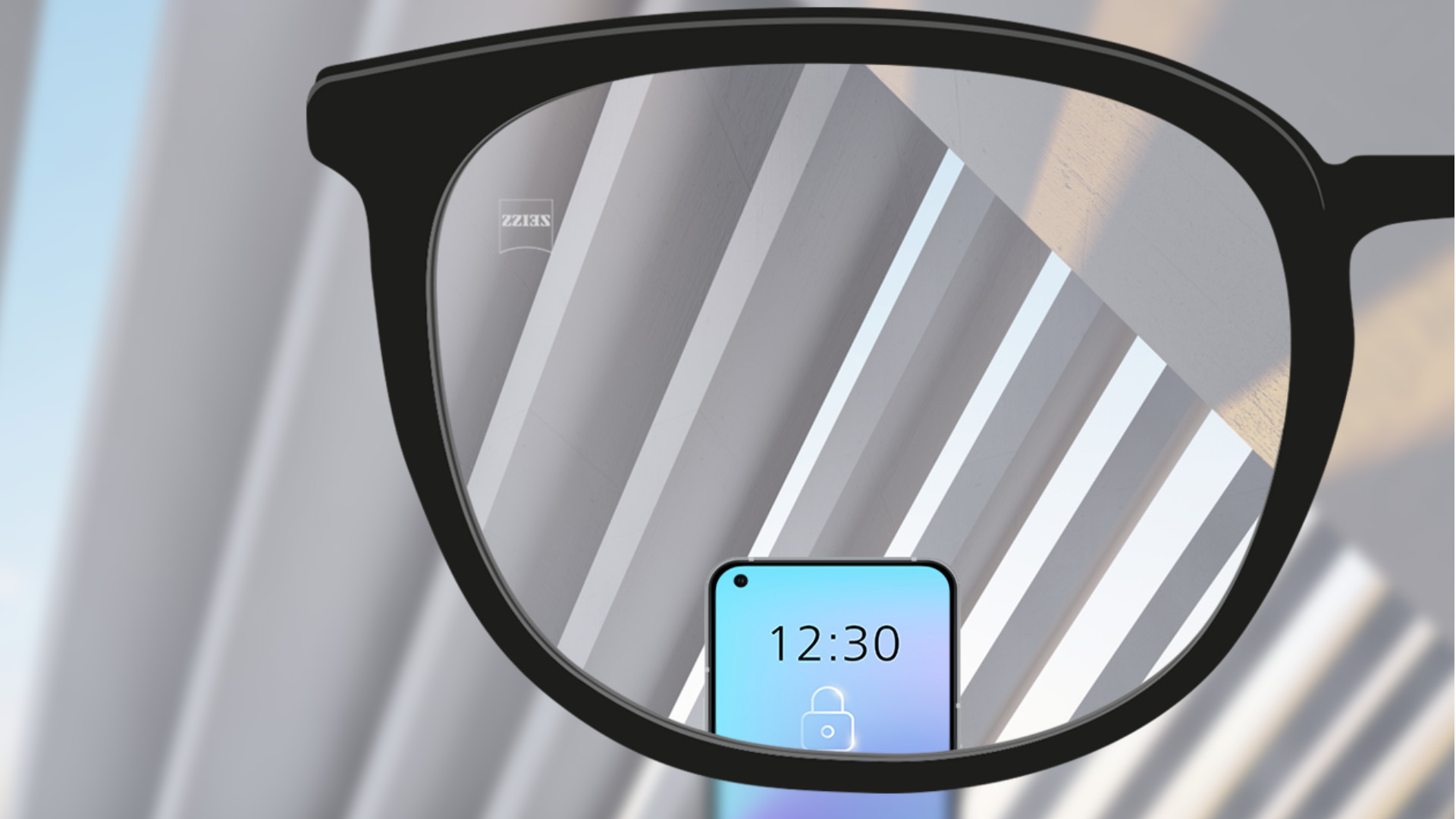 자이스 스마트라이프 단초점 렌즈의 시점으로 본 모습. 스마트폰이 보이고 렌즈가 완전히 선명하다.